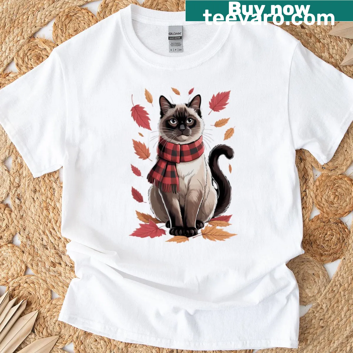 Cute T-shirt featuring a Siamese cat among fall leaves for Thanksgiving — on a men's t-shirt