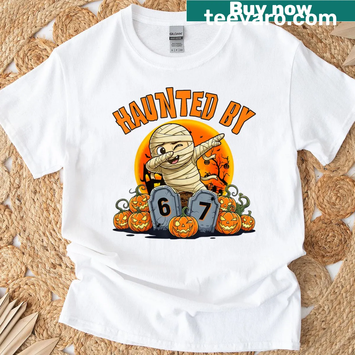 Cartoon mummy T-shirt with a dabbing pose for Halloween — on a men's t-shirt