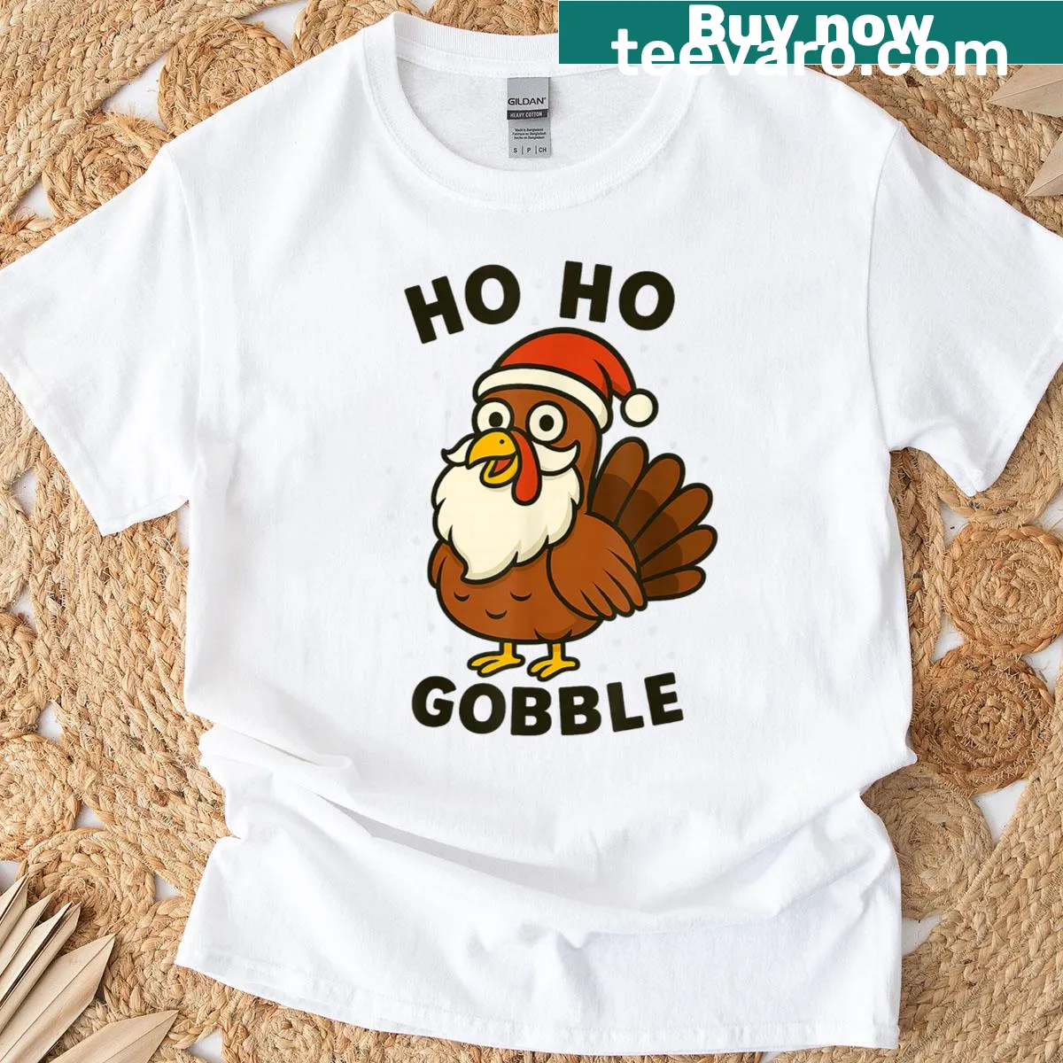 T-shirt featuring a turkey in a Santa hat with 'Ho Ho Gobble' text — on a men's t-shirt