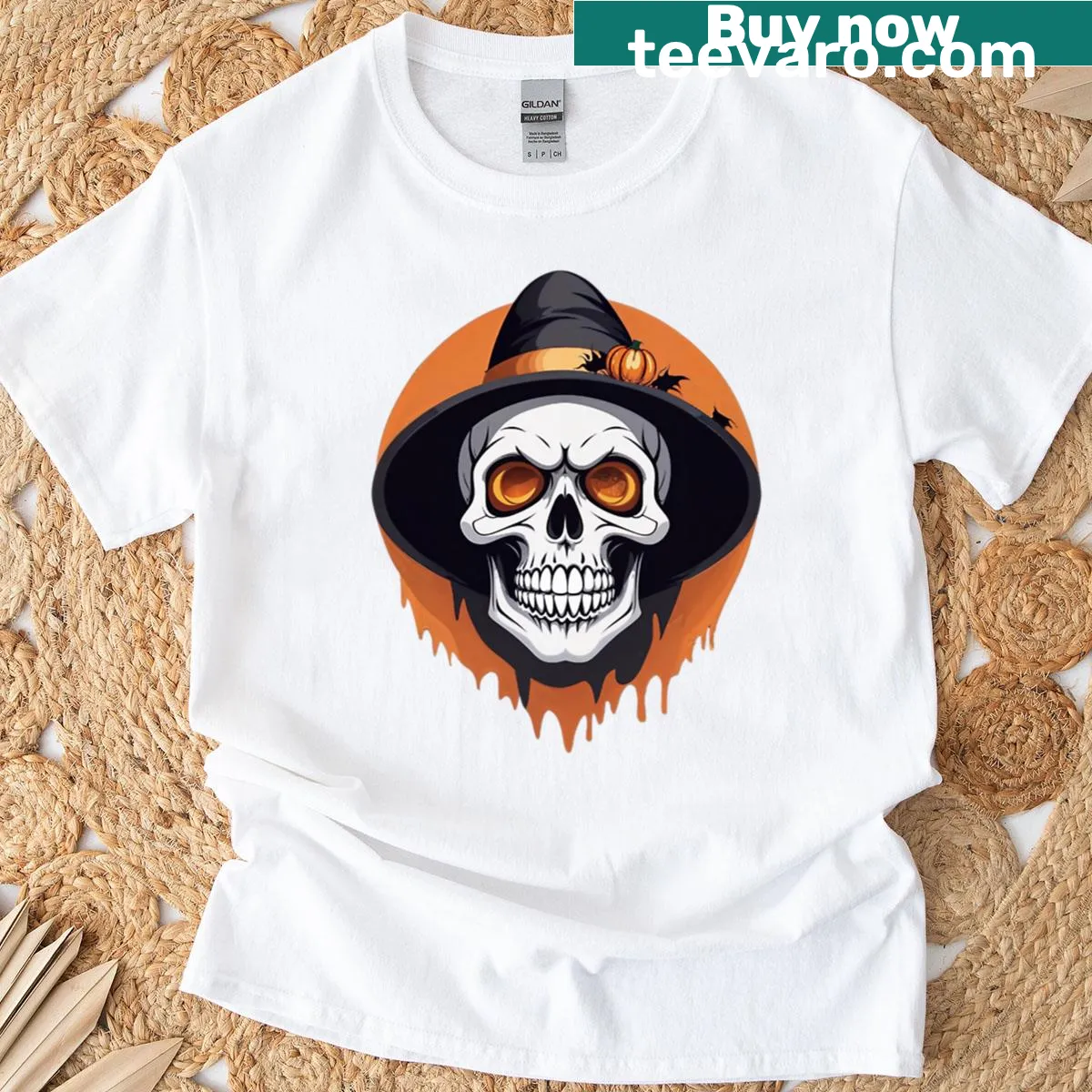 Halloween-themed T-shirt with skull, witch hat, pumpkin, and skeleton — on a men's t-shirt