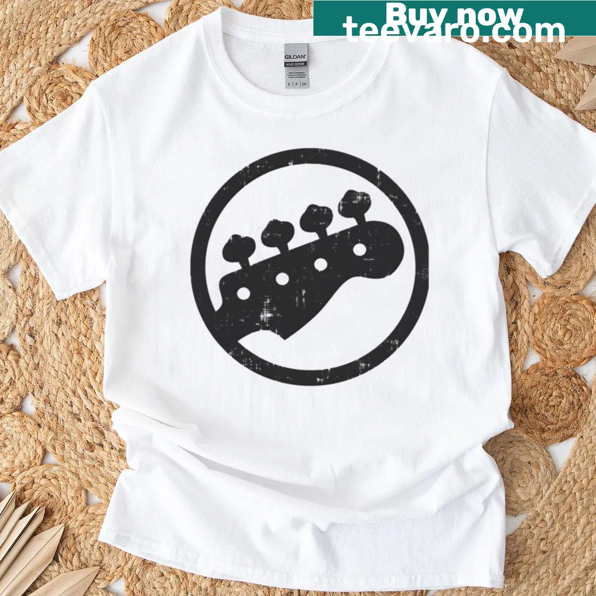 Minimalist T-shirt with a guitar headstock silhouette — on a men's t-shirt