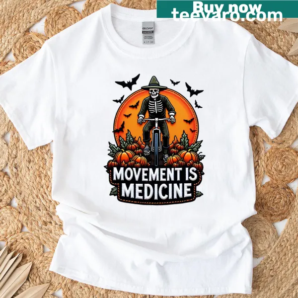 Skeleton on a bicycle with pumpkin graphic T-shirt for Halloween