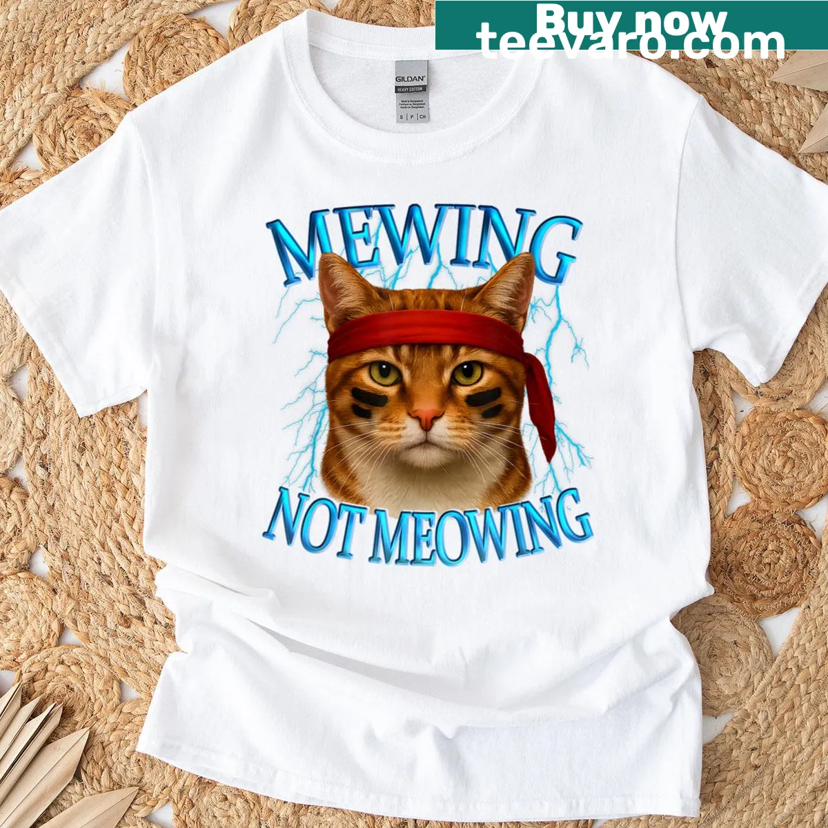 Cartoon orange tabby cat with sarcastic 'Mewing Not Meowing' text — on a men's t-shirt
