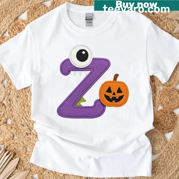 Halloween-themed shirt with a monster eye pumpkin graphic