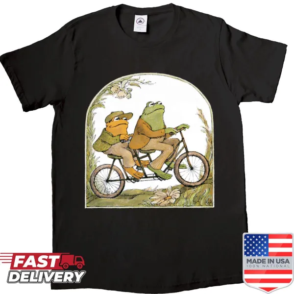 Cartoon shirt featuring a frog and toad riding a bicycle