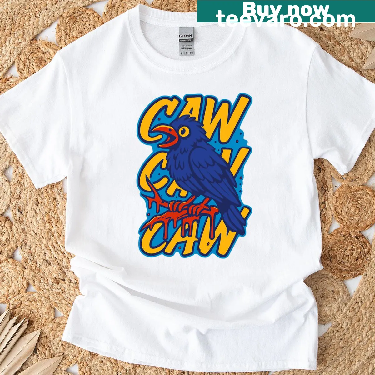 Artistic crow design on an ink splash-themed t-shirt — on a men's t-shirt
