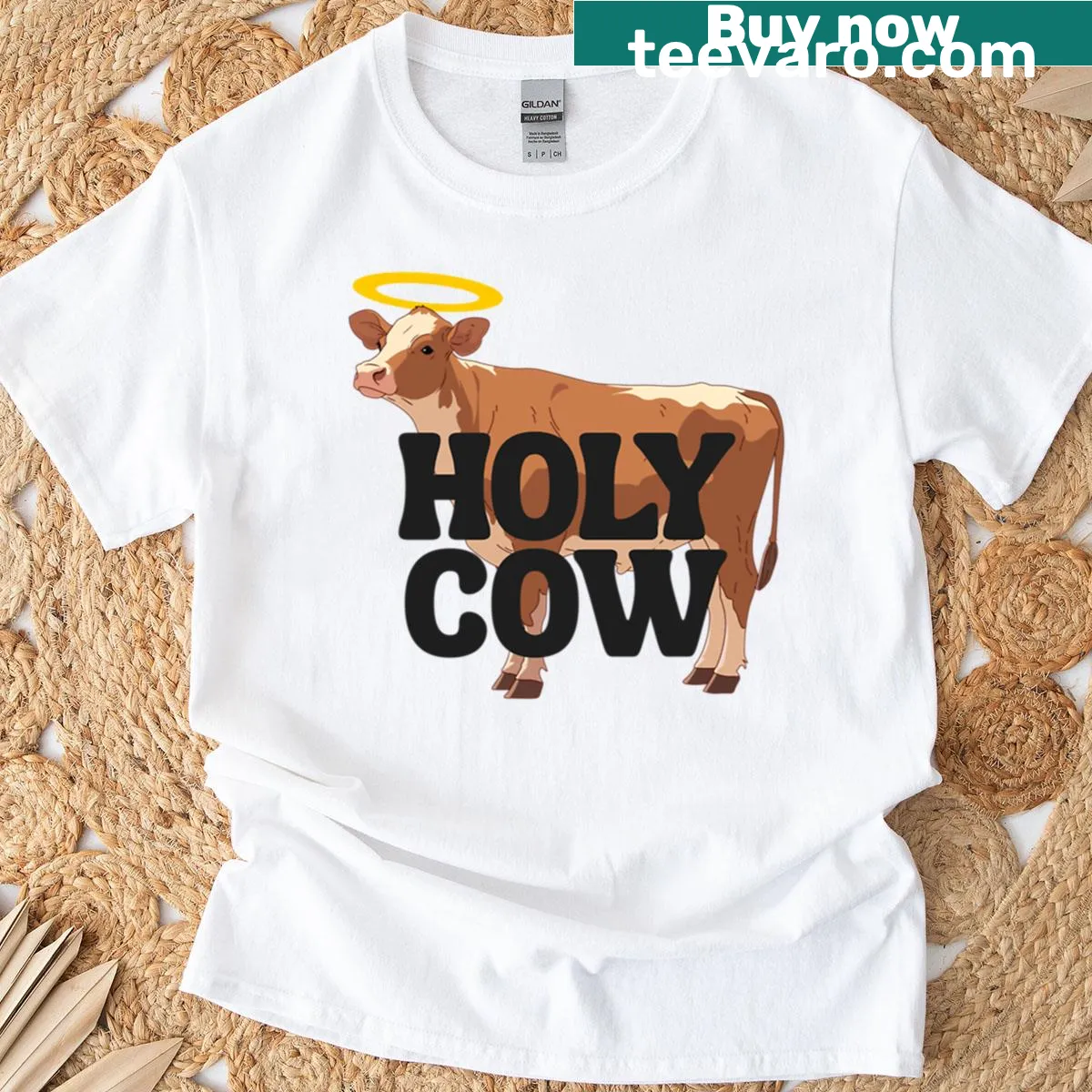 Cute illustration of a cow with a halo on a T-shirt — on a men's t-shirt