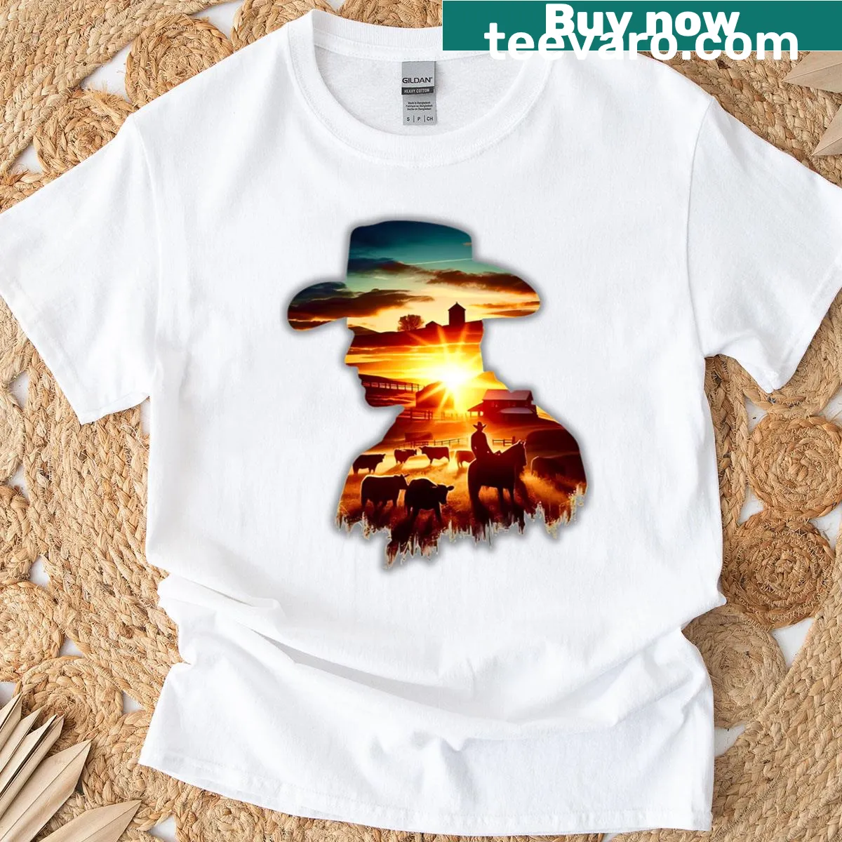Cowboy silhouette against a sunset ranch scene on T-shirt — on a men's t-shirt