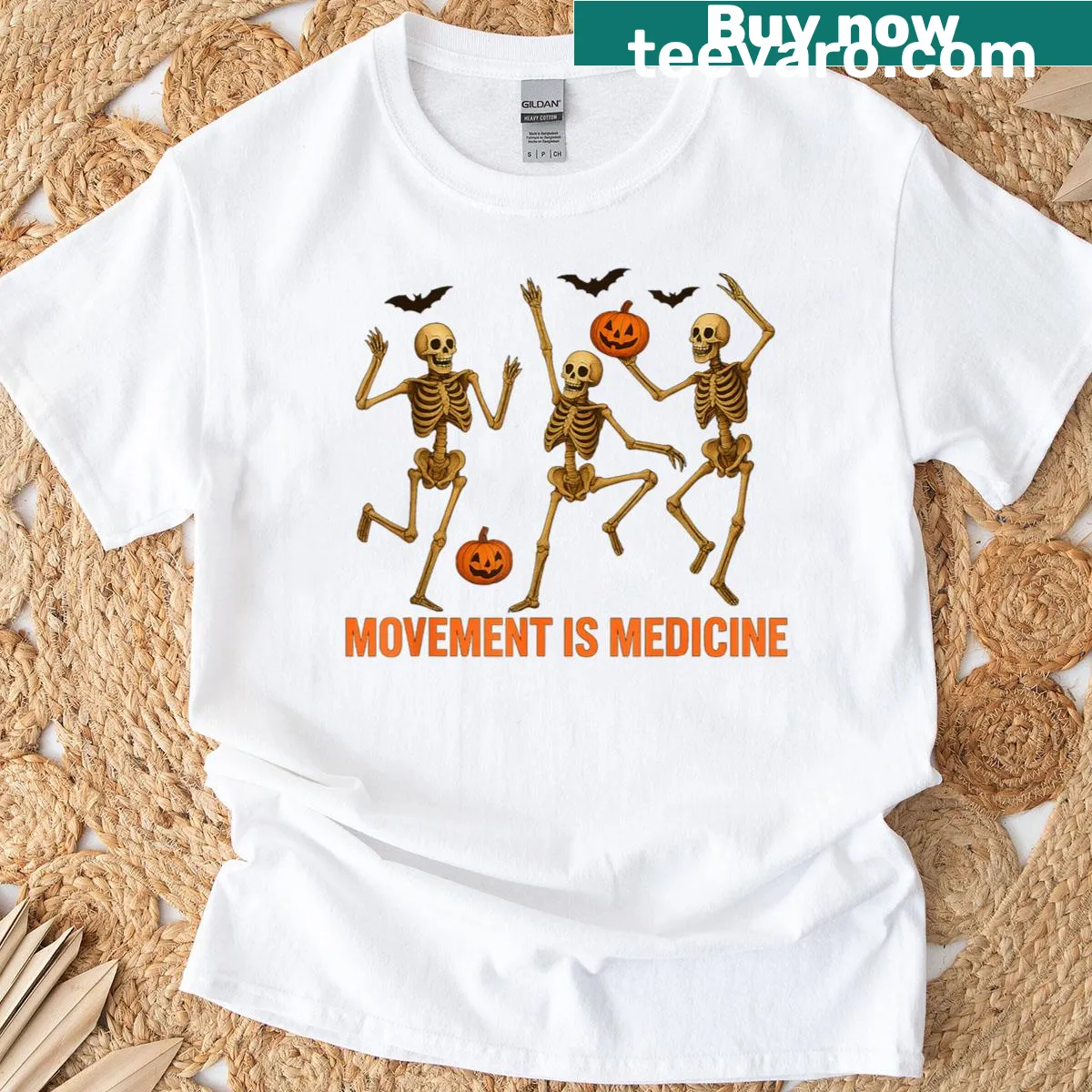 Cartoon dancing skeletons on T-shirt with the quote about movement — on a men's t-shirt
