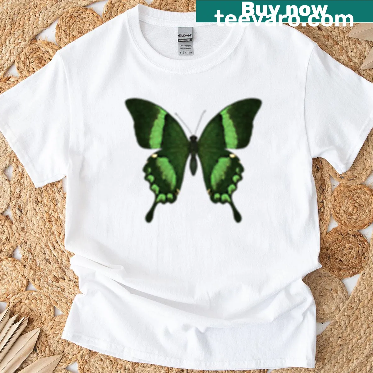 Illustrated emerald swallowtail butterfly on a boxy t-shirt — on a men's t-shirt