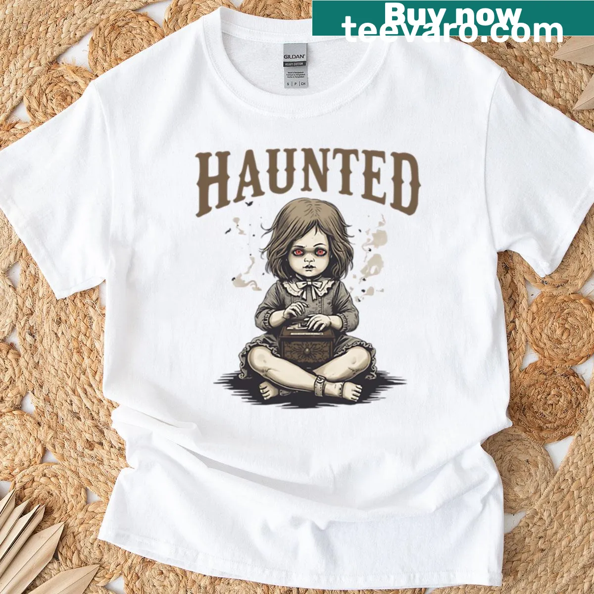 T-shirt featuring a haunted doll and cracked music box design — on a men's t-shirt