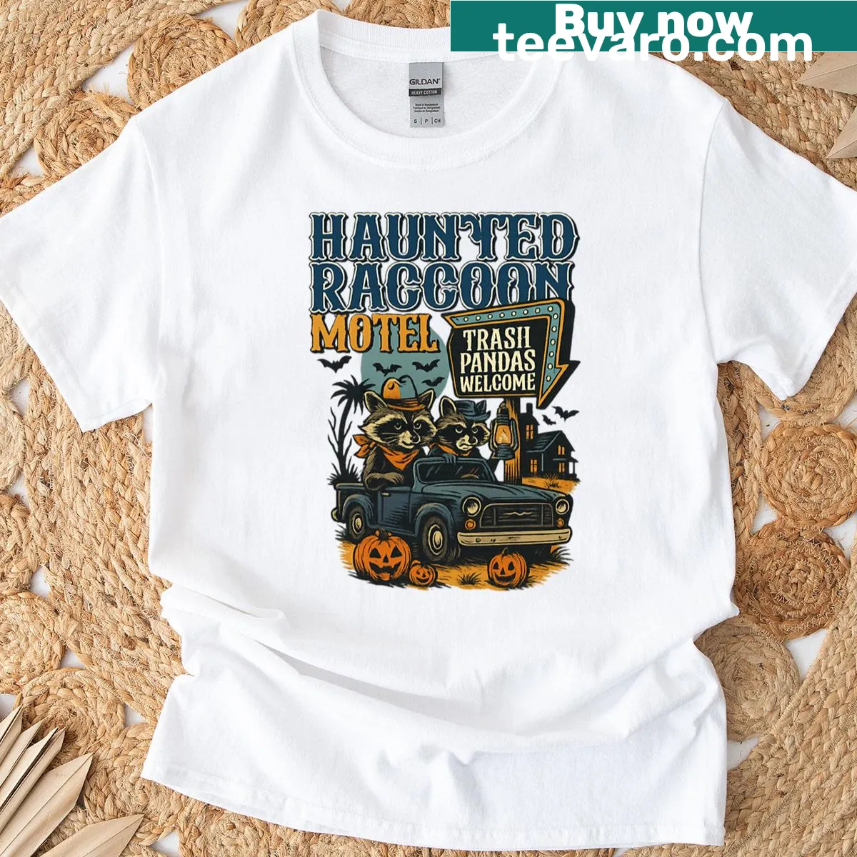 Retro Haunted Raccoon Motel shirt with spooky design — on a men's t-shirt