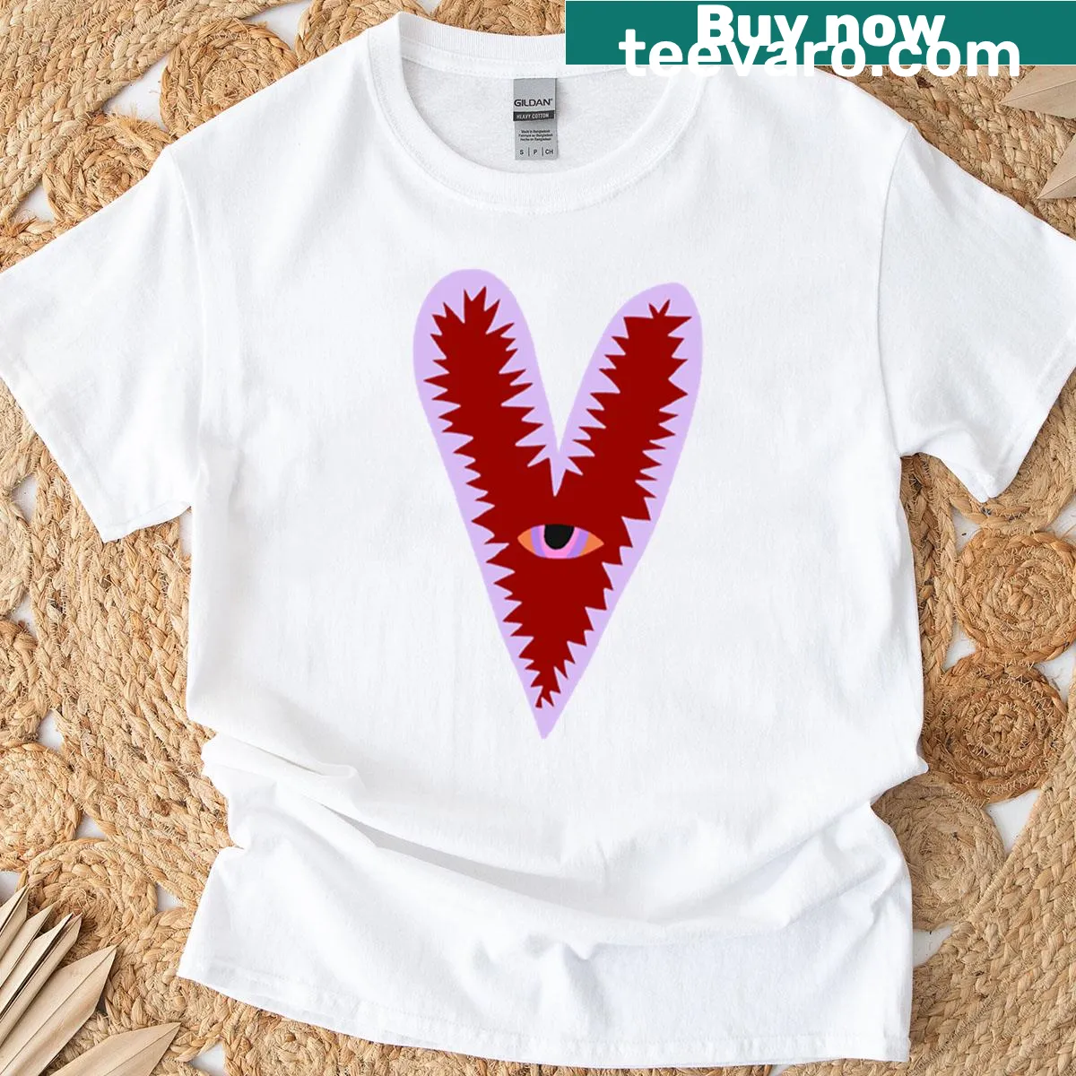 Oversized t-shirt featuring a heart with eyes illustration — on a men's t-shirt