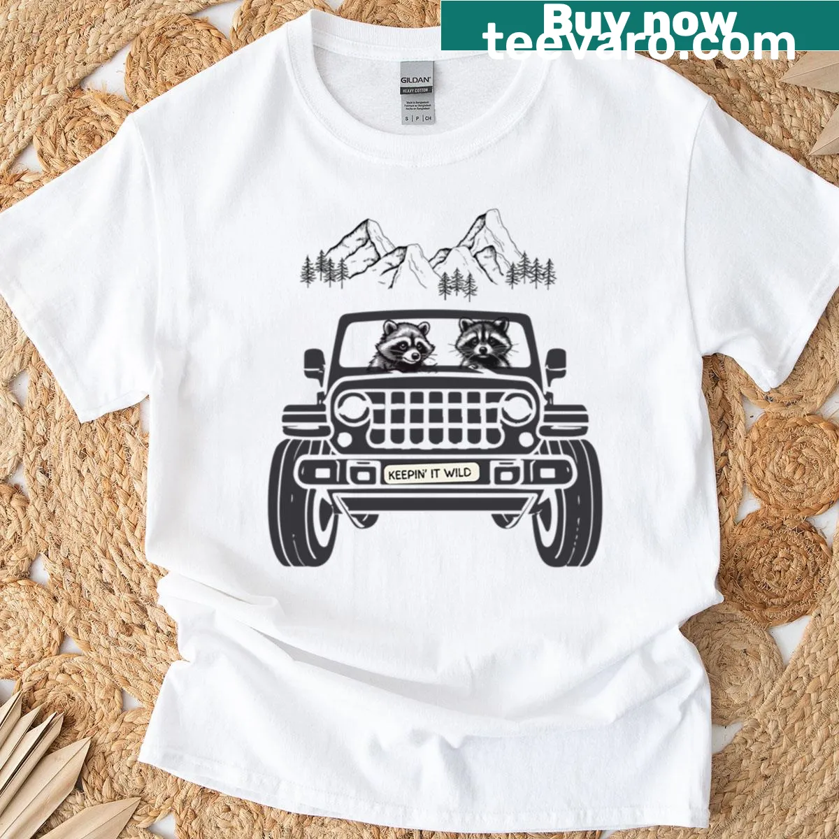 Graphic T-shirt with raccoon on a road trip with mountains — on a men's t-shirt