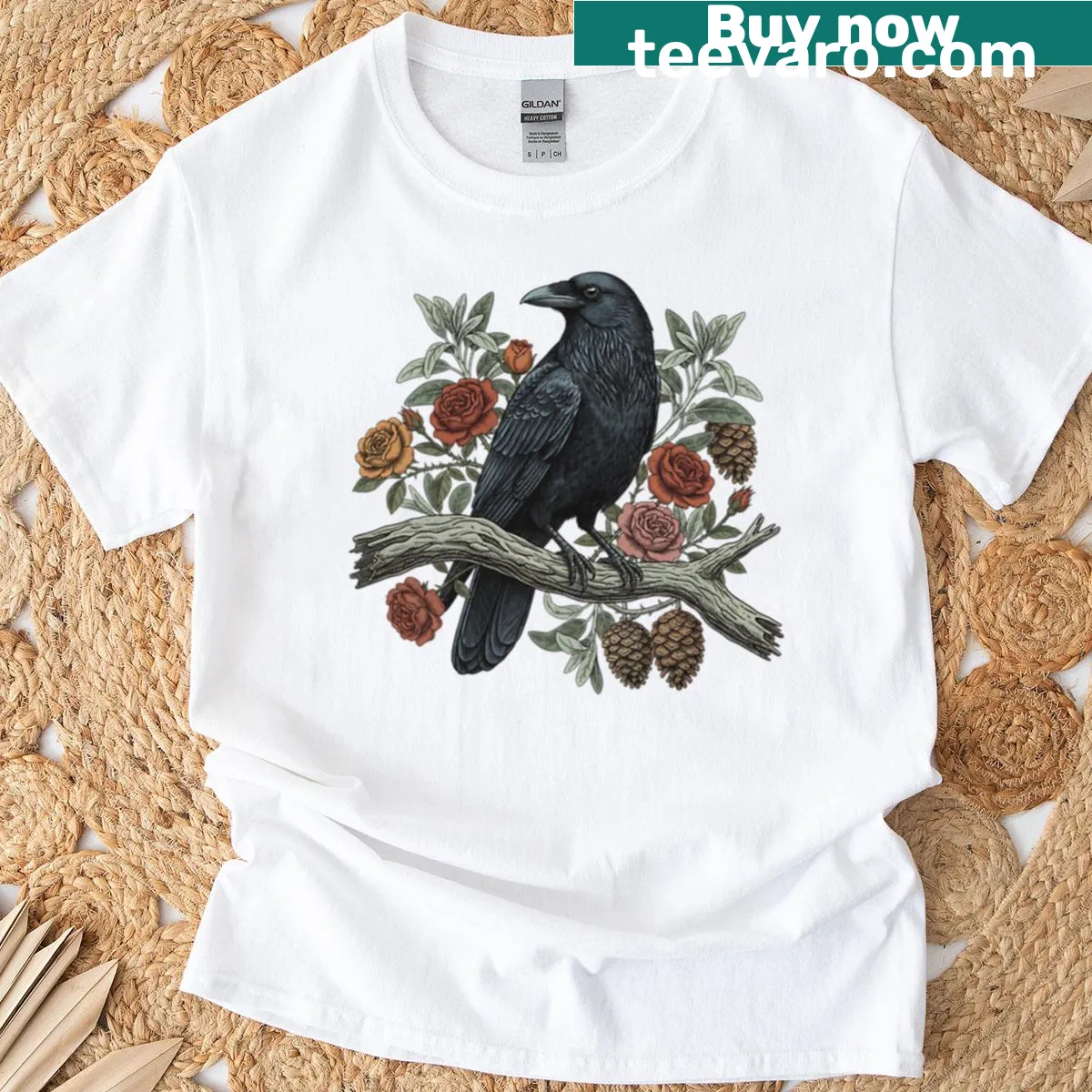 Artistic t-shirt featuring a raven and floral elements in a mystical design. — on a men's t-shirt