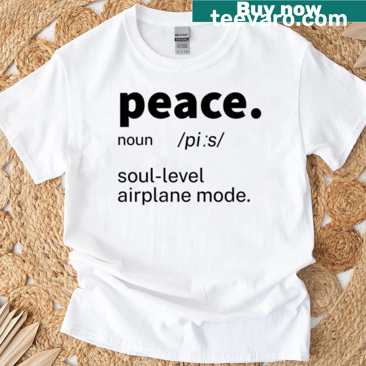 Inspirational oversized t-shirt with a definition of peace graphic. — on a men's t-shirt
