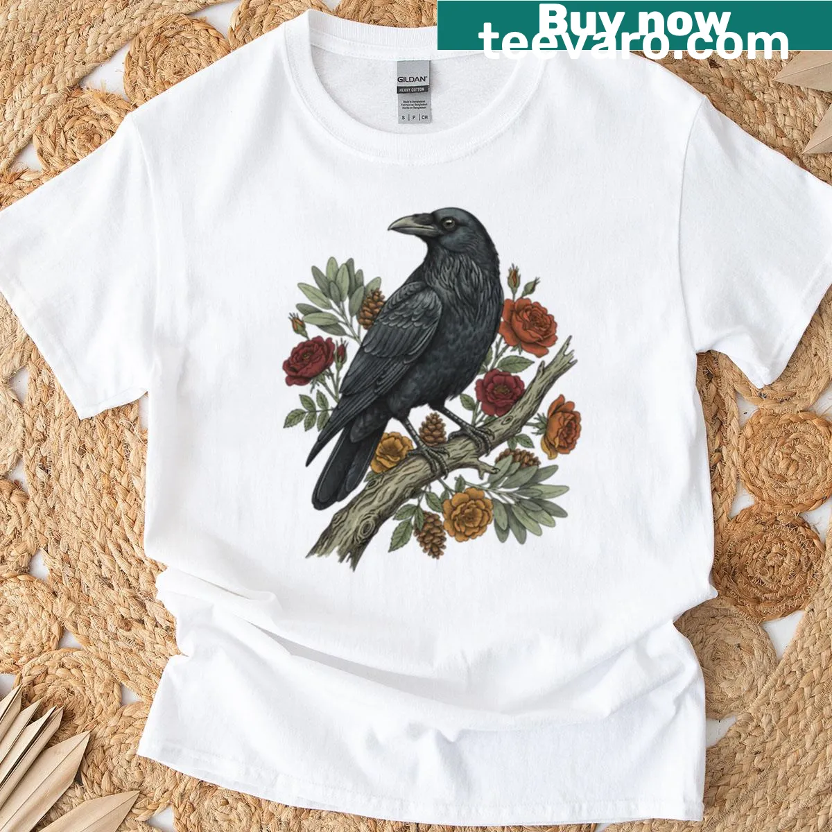Raven perched on a floral branch graphic T-shirt. — on a men's t-shirt
