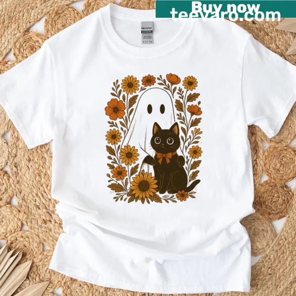 Oversized t-shirt with illustrated black cat, ghost, and autumn flowers