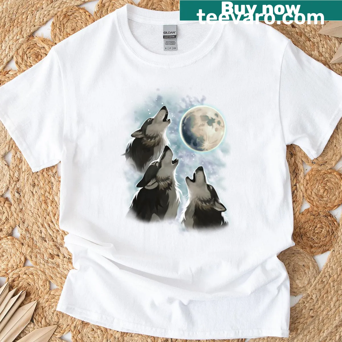 T-shirt featuring three wolves howling at a full moon — on a men's t-shirt