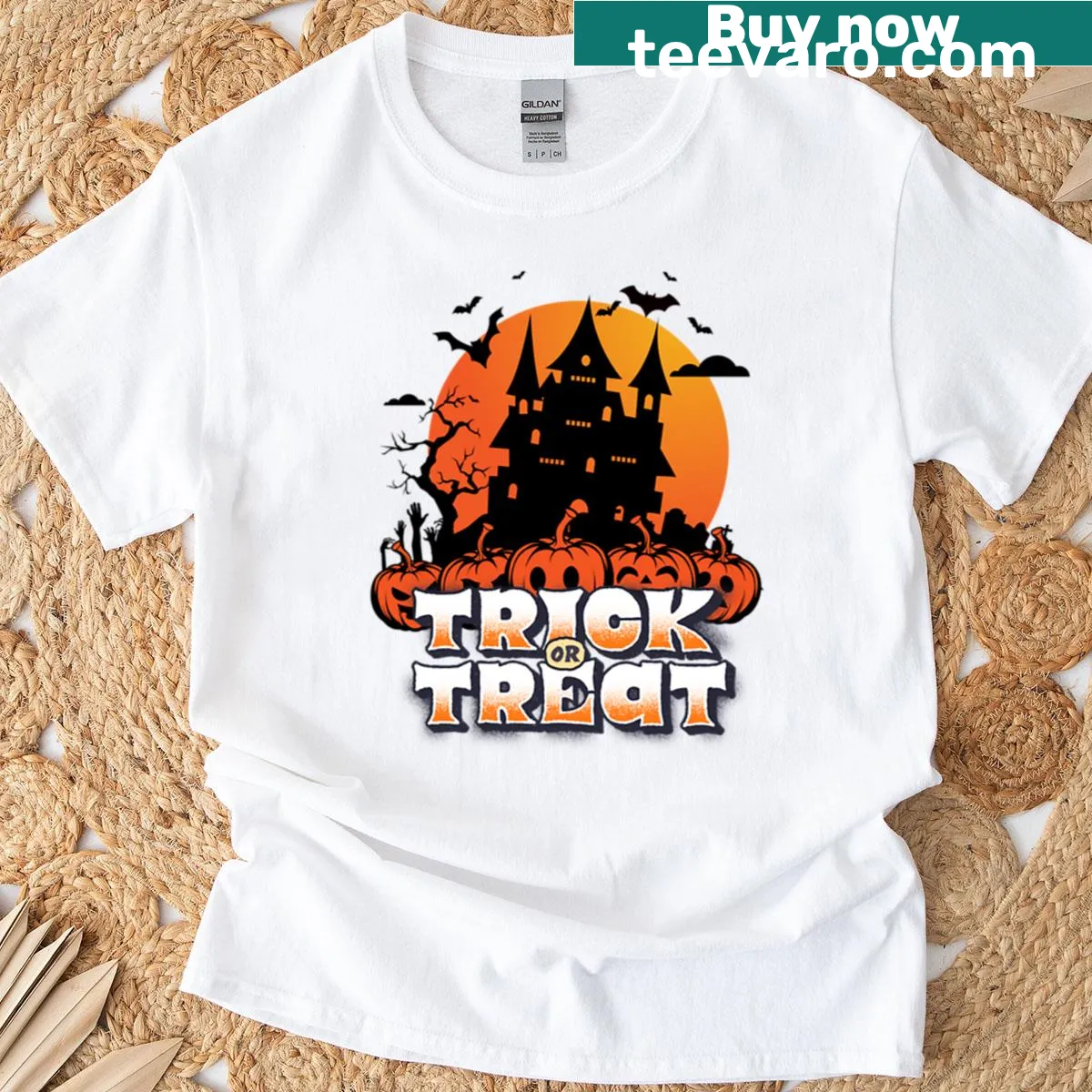Haunted castle and pumpkins graphic on Halloween T-shirt — on a men's t-shirt