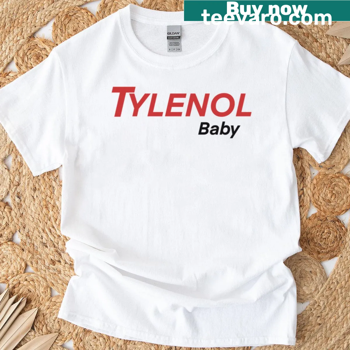 Oversized t-shirt with playful Tylenol baby sticker graphic — on a men's t-shirt
