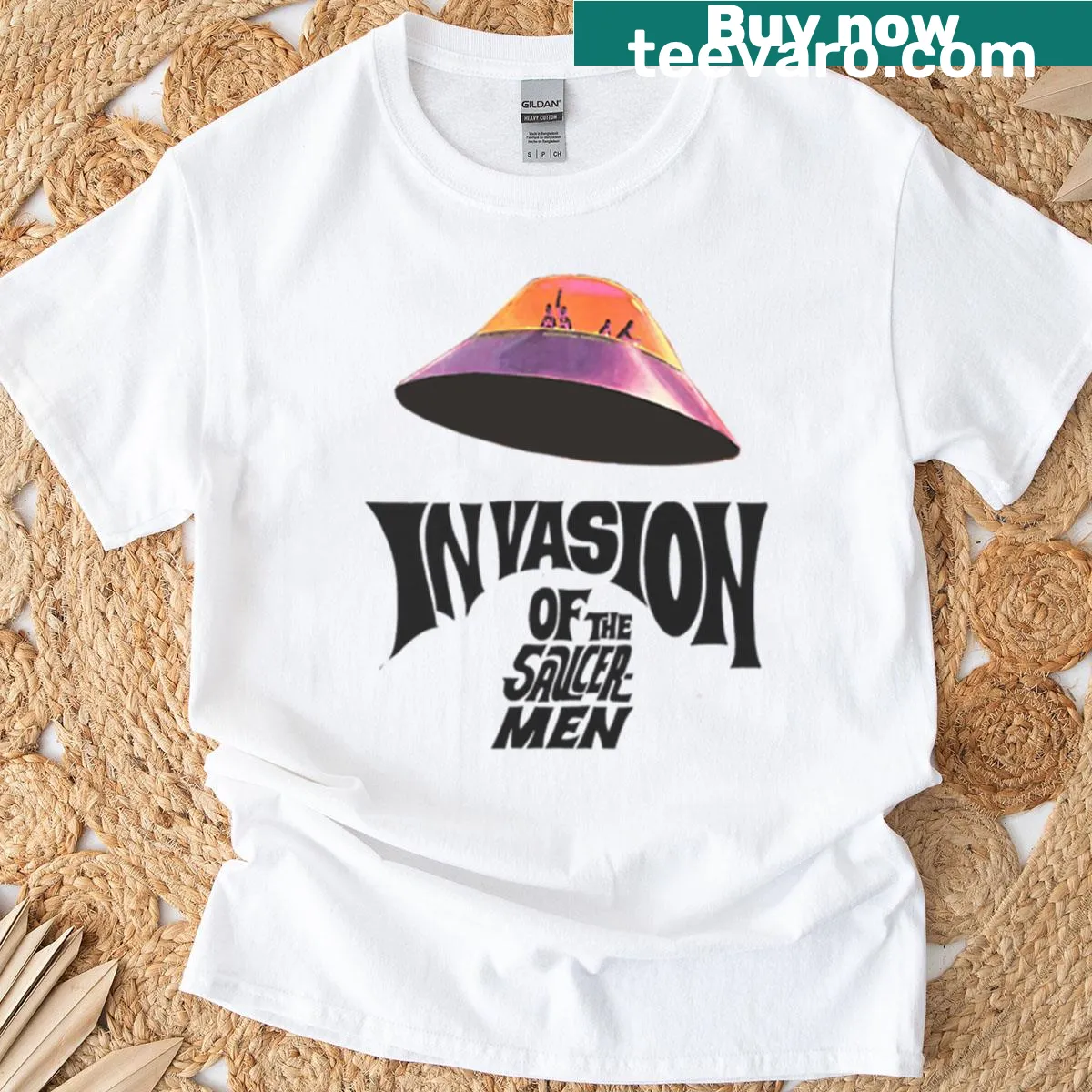Vintage distressed t-shirt featuring cartoonish aliens and saucers — on a men's t-shirt