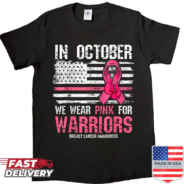 Shirt featuring a pink ribbon symbol for breast cancer awareness