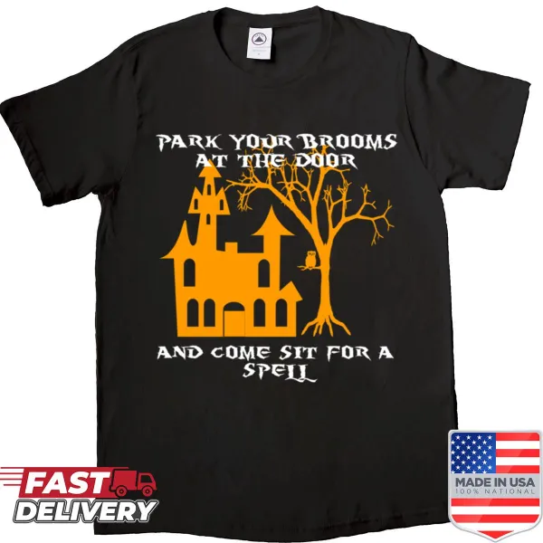 Playful shirt with whimsical white houses and broom theme