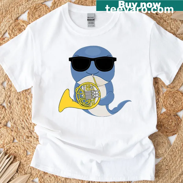 Cartoon whale in sunglasses playing a French horn graphic t-shirt