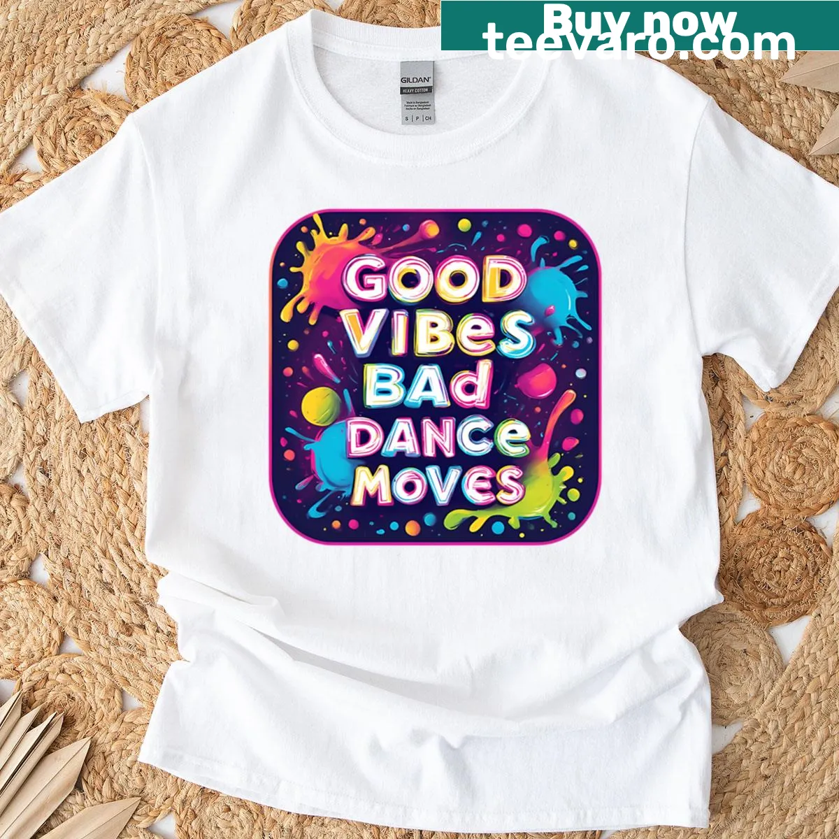 Playful T-shirt featuring 'Good Vibes Bad Dance Moves' text — on a men's t-shirt