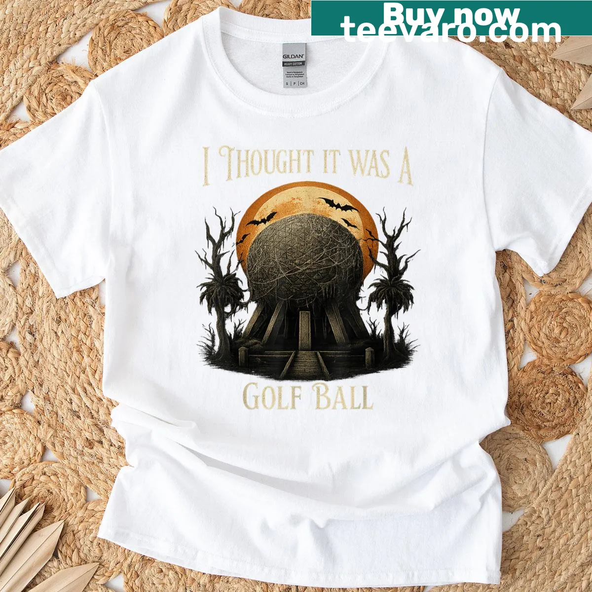 Whimsical Halloween T-shirt with bats and moon, featuring golf phrase — on a men's t-shirt