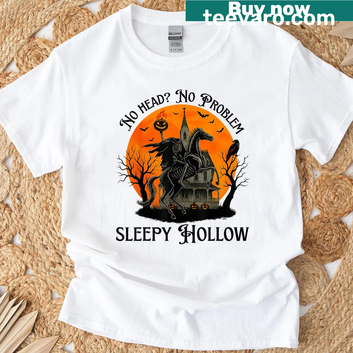 Headless Horseman t-shirt with spooky pumpkin and skeleton graphics — on a men's t-shirt