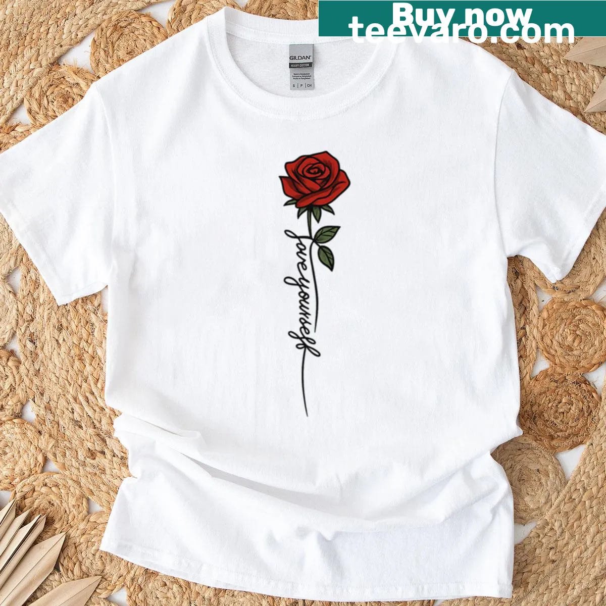 Minimalist t-shirt with an elegant red rose design — on a men's t-shirt
