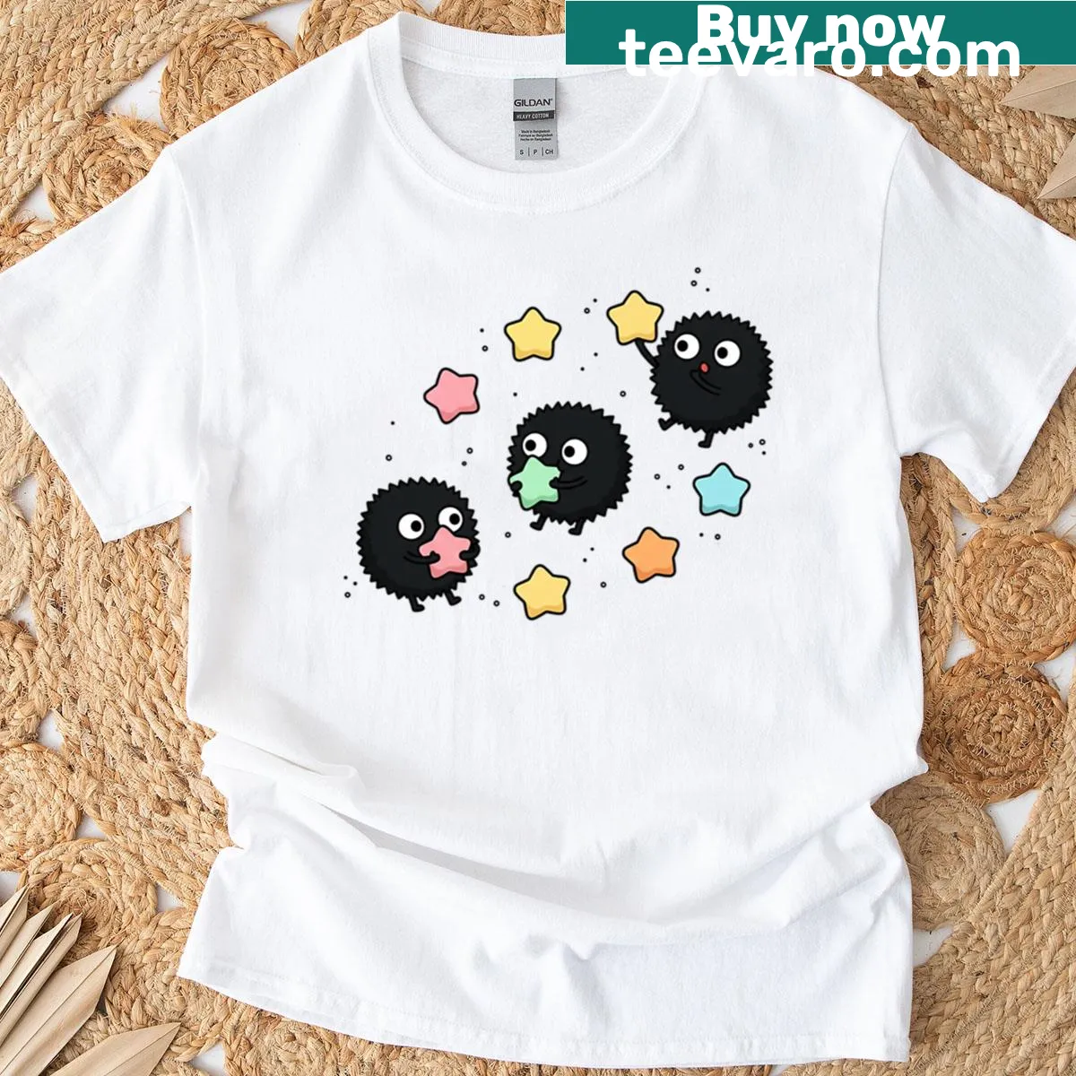 Charming soot sprites surrounded by whimsical stars — on a men's t-shirt