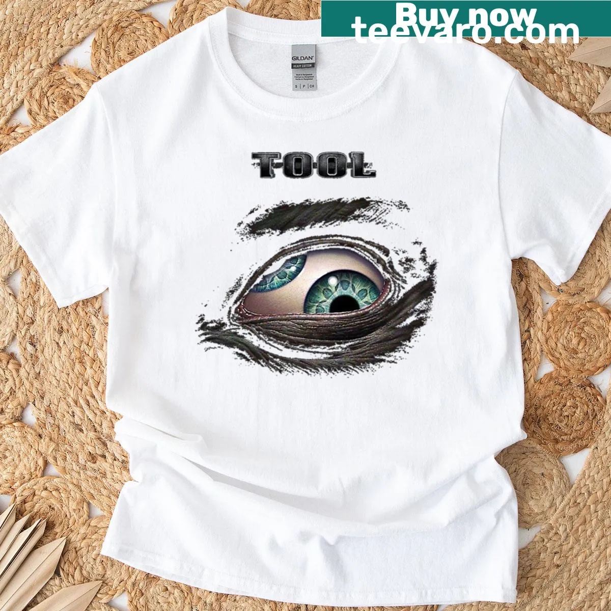 Vintage-style T-shirt celebrating Tool band with distressed graphic — on a men's t-shirt