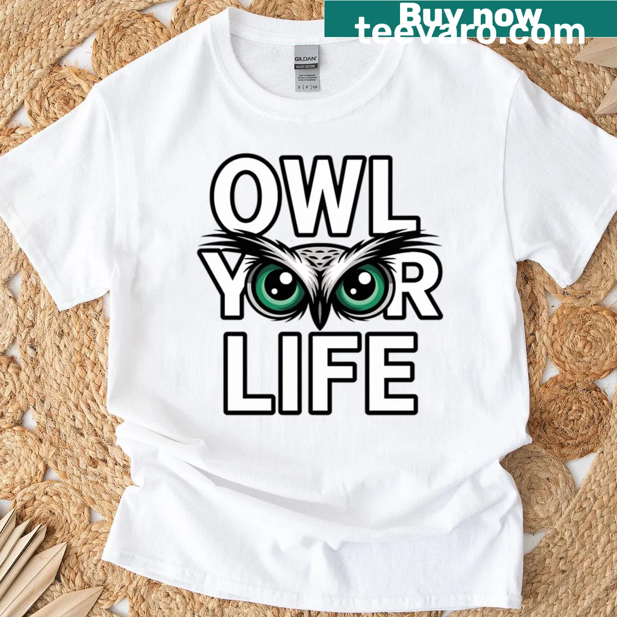 Motivational Owl graphic t-shirt with bold eyes and inspirational text — on a men's t-shirt
