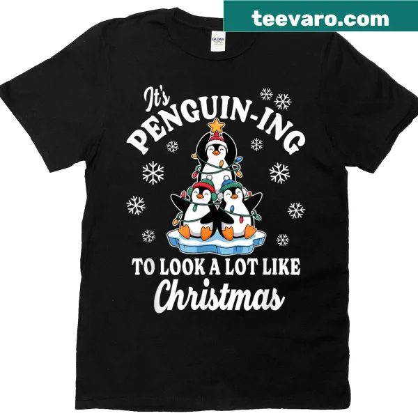 Cute penguin decorating a Christmas tree on ice graphic