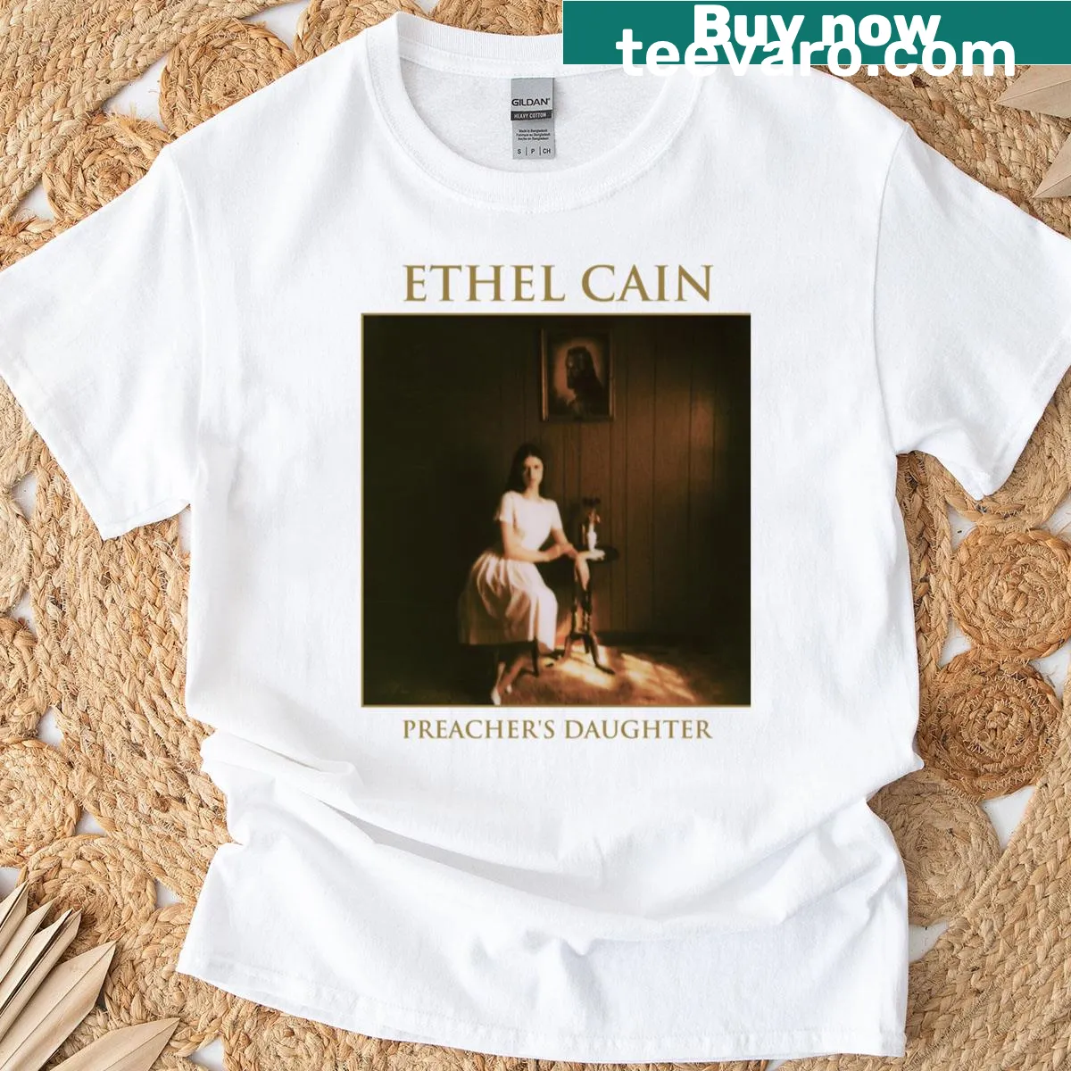 T-shirt featuring the phrase 'Preacher's Daughter - Cain' in simple text — on a men's t-shirt