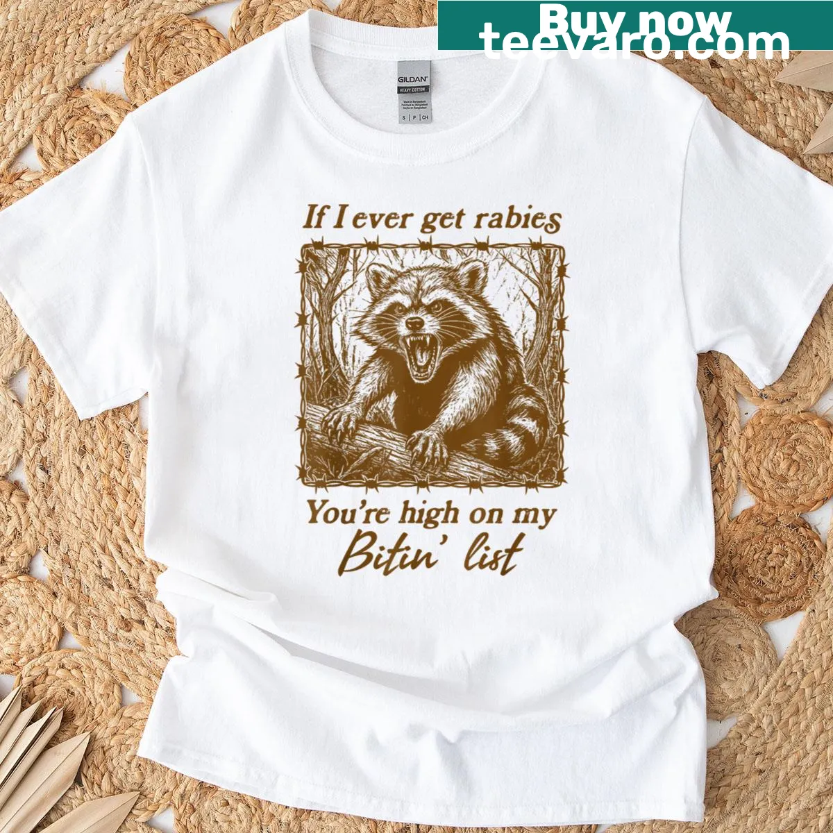 Funny T-shirt with cartoon raccoon and humorous text — on a men's t-shirt