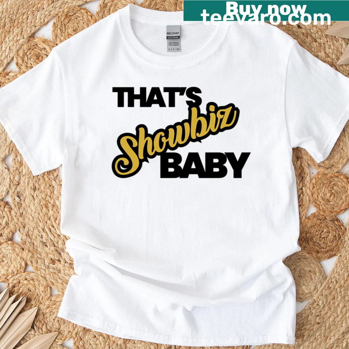 Vintage gold lettering 'Showbiz' on a script t-shirt — on a men's t-shirt