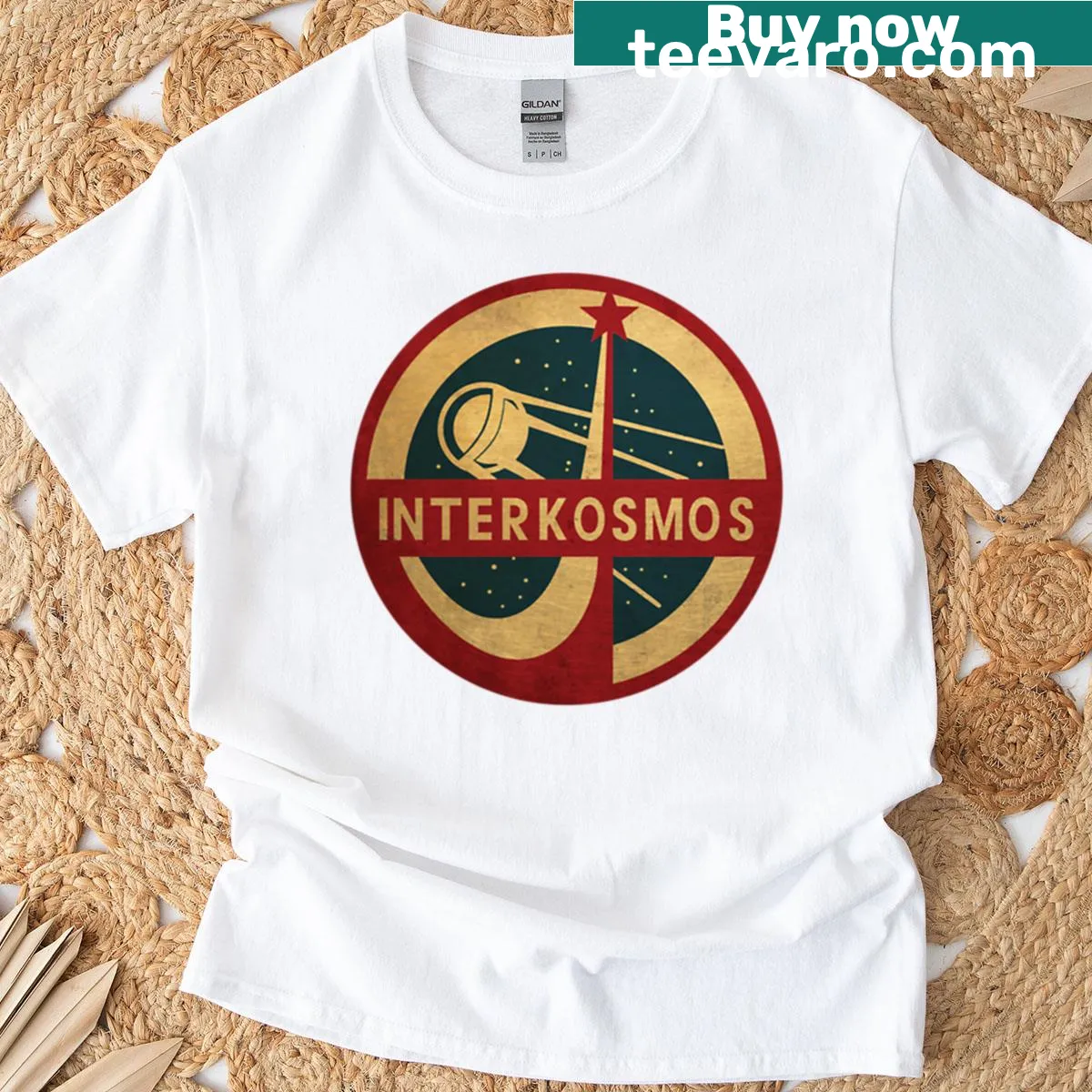 Vintage Sputnik satellite t-shirt with Interkosmos graphic — on a men's t-shirt