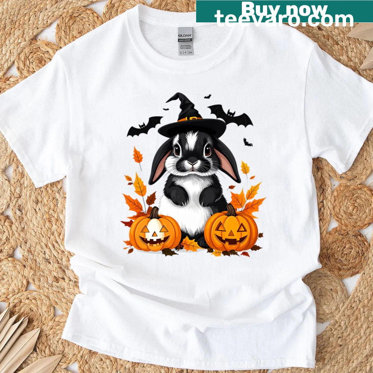 Oversized T-shirt with a Halloween bunny in a witch hat and pumpkins — on a men's t-shirt