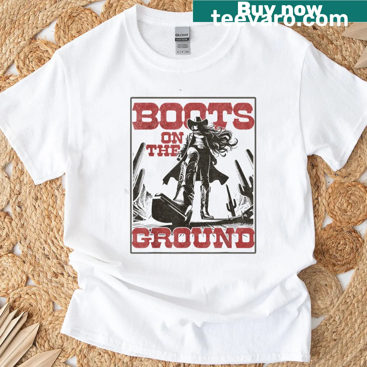 Vintage Western T-shirt with graphic of cowgirl boots on the ground — on a men's t-shirt