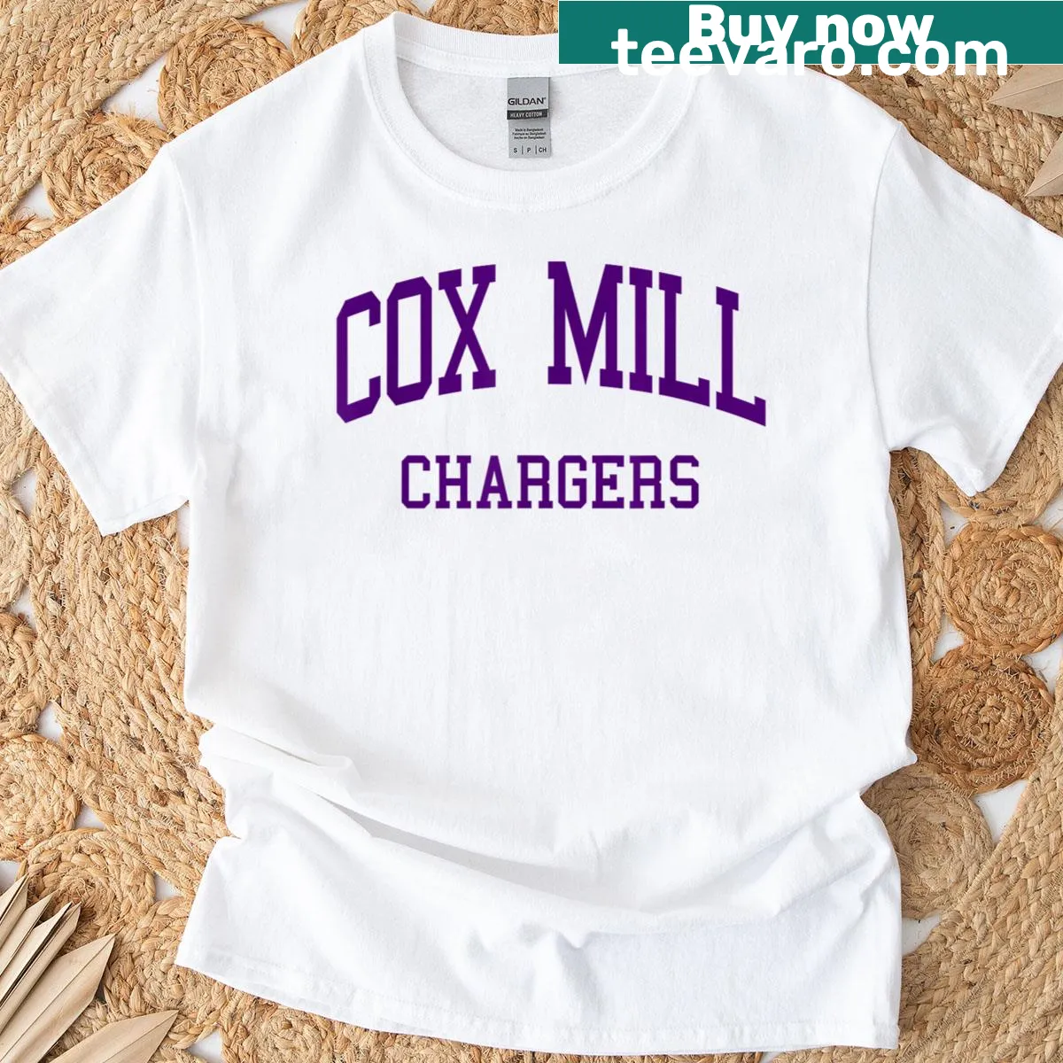 Retro Cox Mill High School logo graphic on T-shirt — on a men's t-shirt