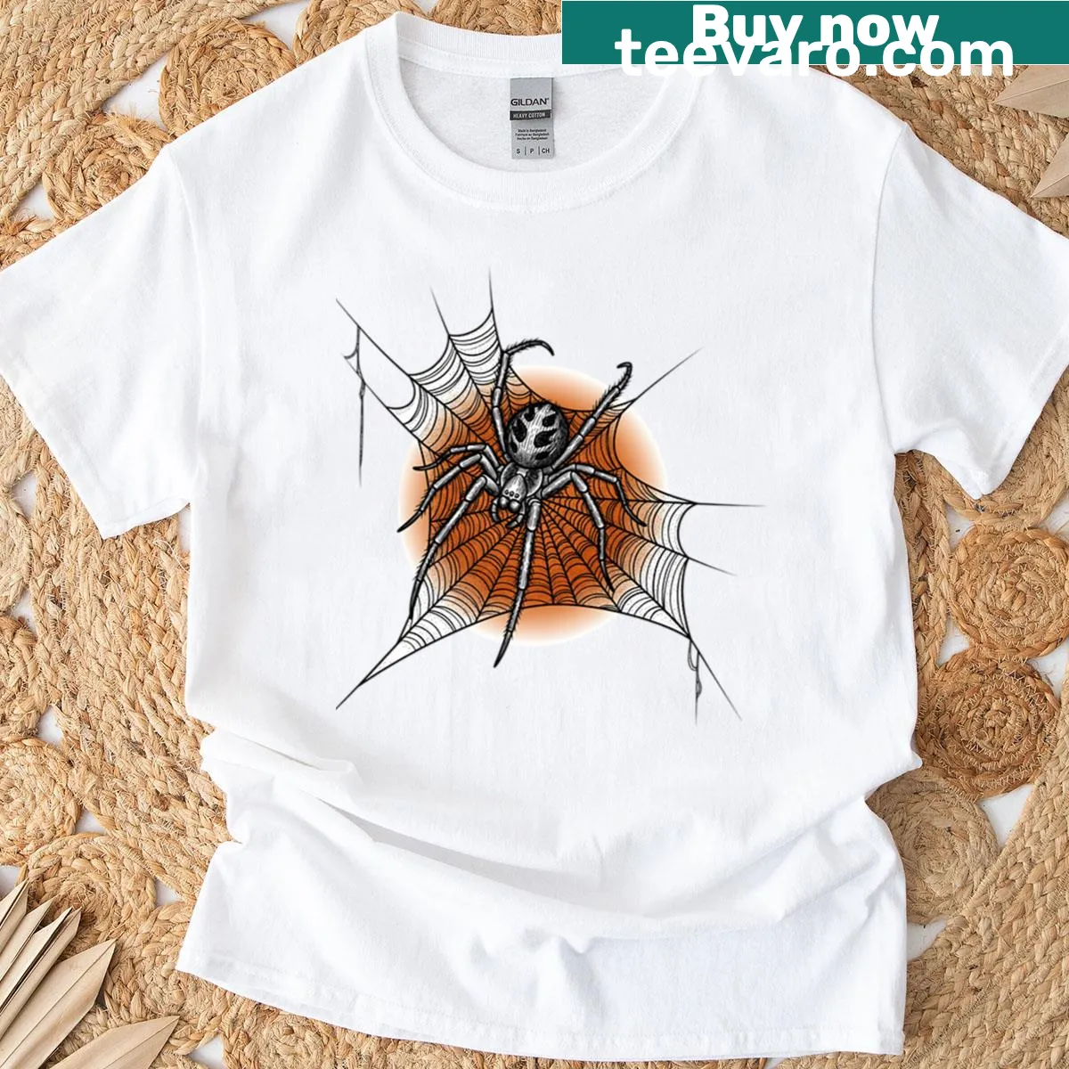 Intricately designed creepy spider in a web graphic — on a men's t-shirt