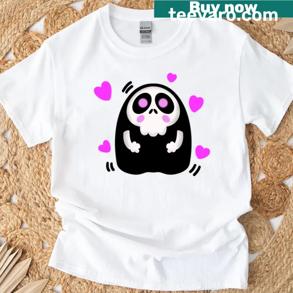 Kawaii skull design with pink hearts on a t-shirt.