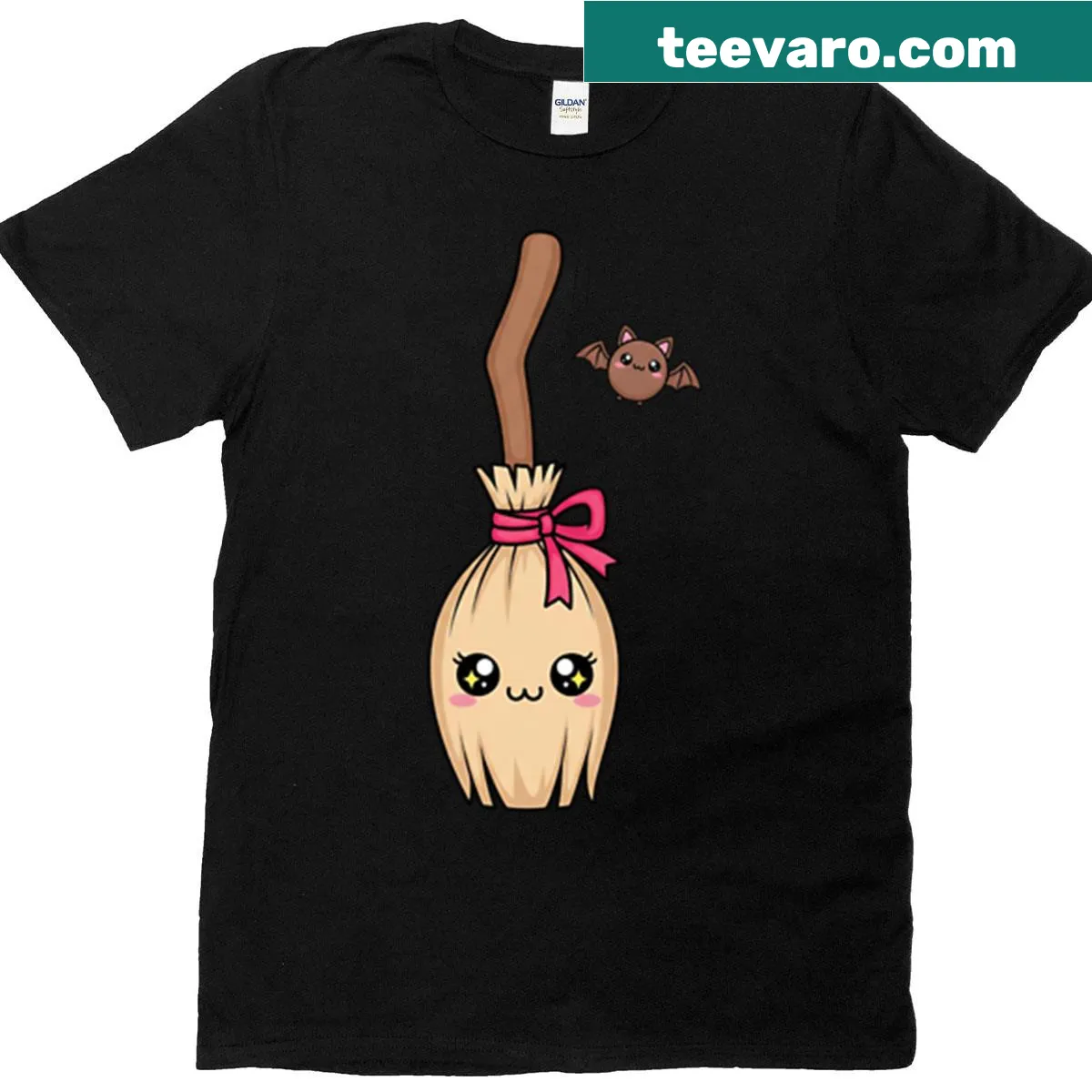 Kawaii witch's broom and bat cartoon design on oversized t-shirt — on a men's t-shirt