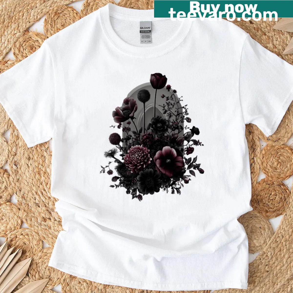 T-shirt featuring a dark floral illustration — on a men's t-shirt