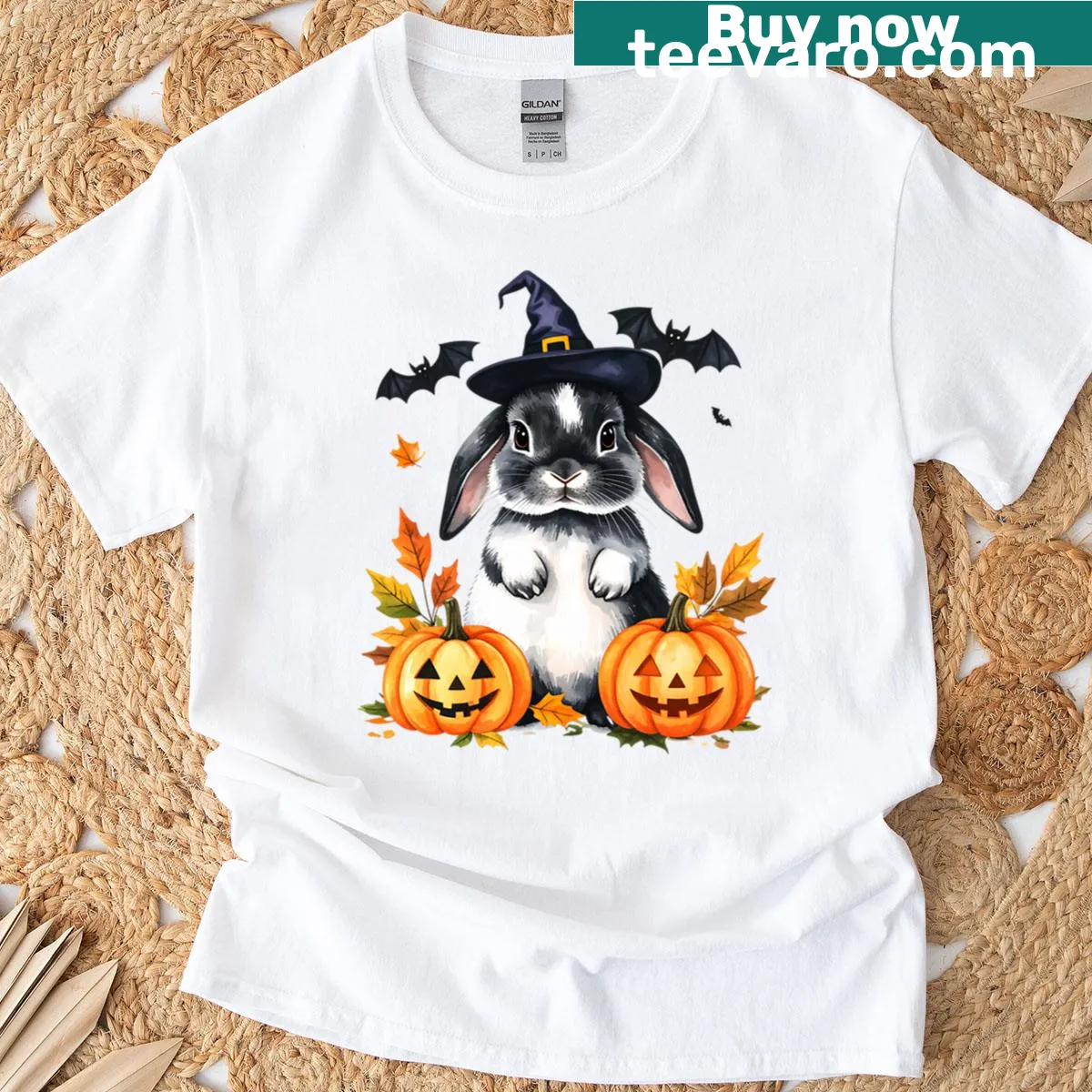 Illustration of a bunny in a witch hat with pumpkins for Halloween — on a men's t-shirt