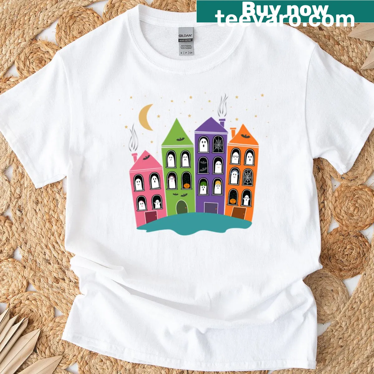 Haunted city-themed Halloween t-shirt with spooky illustrations — on a men's t-shirt